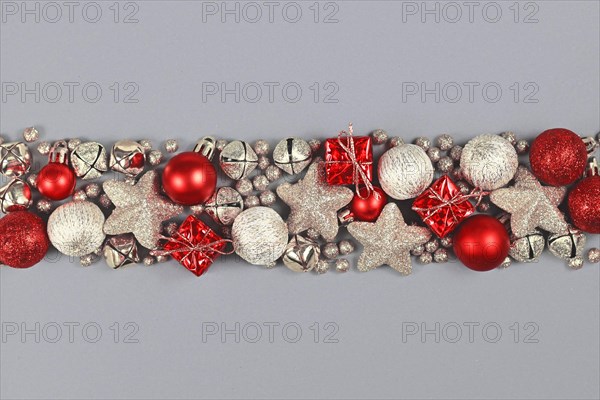 Silver and red Christmas ornaments like small gift boxes