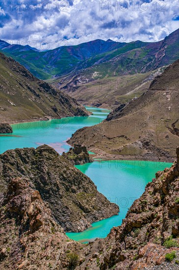 Turquoise lake on the Karo-La Pass along the Friendship Highway