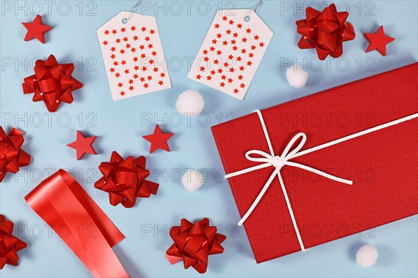 Christmas present gift wrapping concept with red gift box