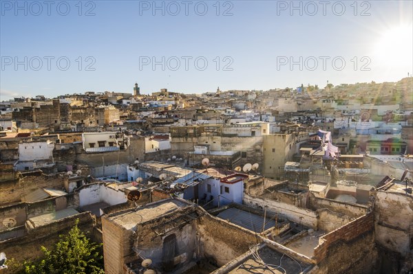 Aerial panoramic view of historic downtown called medina at sunset