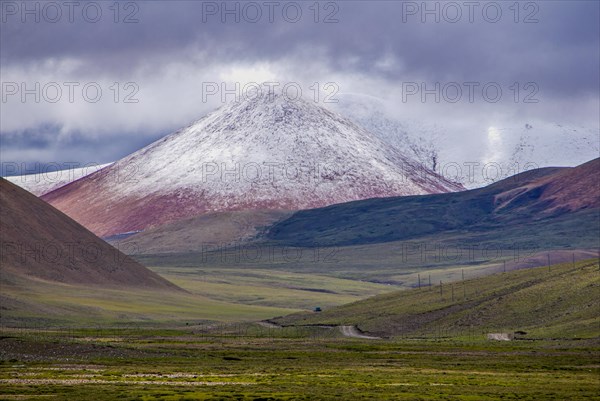 Open wide tibetan landscape along the road from Tsochen to Lhasa