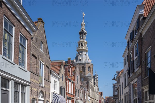 Town hall and historic house facades in Meelstraat