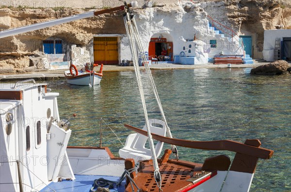 The Quaint Fishing Village with the Colorful Syrmata Boathouses in the small village of Mandraki on the island of Milos