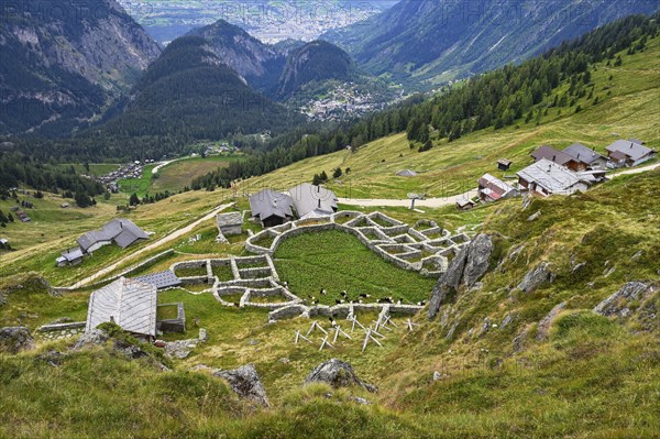 Enclosure made of dry stone walls for traditional alpine pasture management that was originally used for cattle grazing