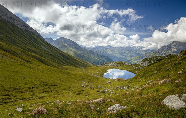 View over the valley at Lake Monzabon near Lech am Arlberg in Austria