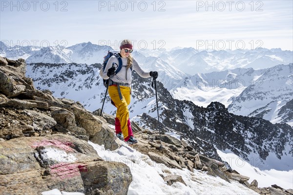 Mountaineer at the summit of the Sulzkogel