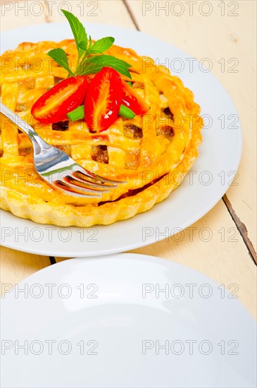 Fresh baked home made beef pie macro closeup