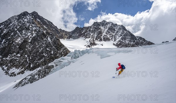 Ski tourers on the descent at Alpeiner Ferner