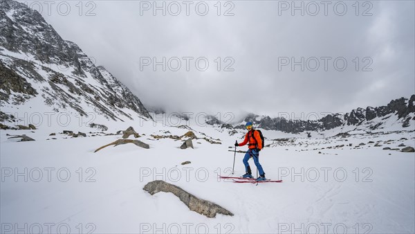 Skiers on the descent