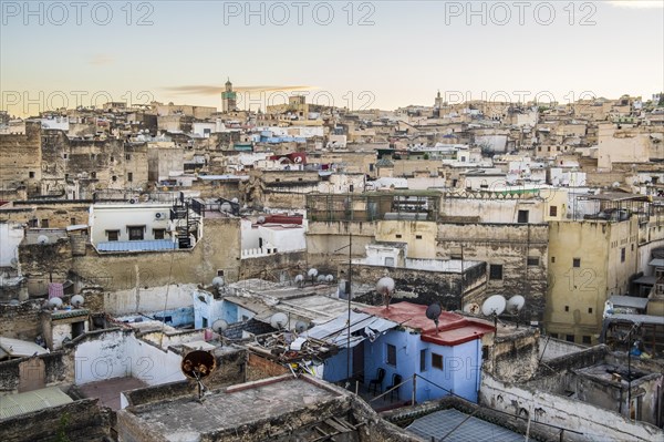 Aerial panoramic view of historic downtown called medina at sunset