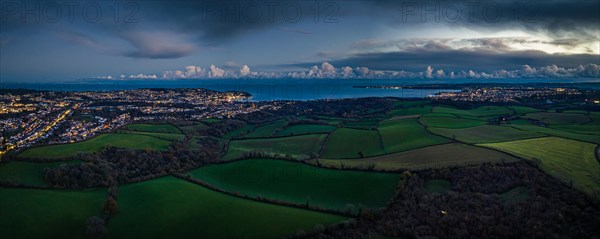 Night Panorama over Fields and Farms of Torquay and Paignton from a drone