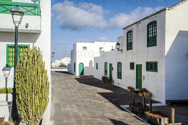 Picturesque white and green settlement called Pueblo Marinero designed by Cesar Manrique located in Costa Teguise