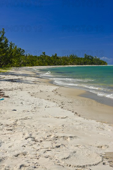 Long white sand beach in the east of the island Ile Sainte-Marie although Nosy Boraha