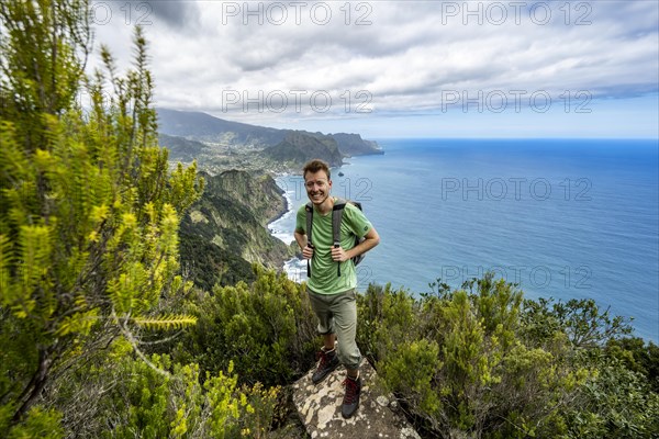 Hiker standing on a rock