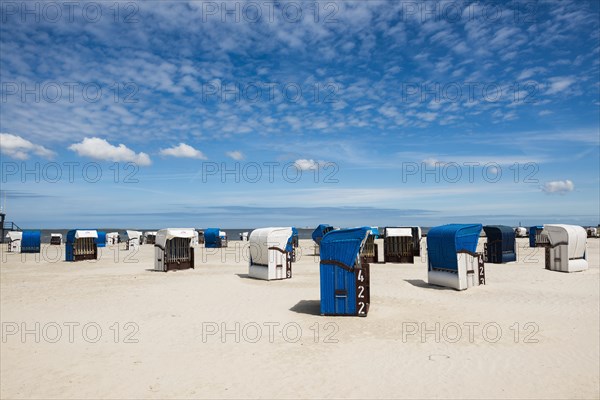 Beach chairs on the sandy beach