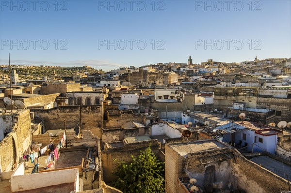 Aerial panoramic view of historic downtown called medina at sunset