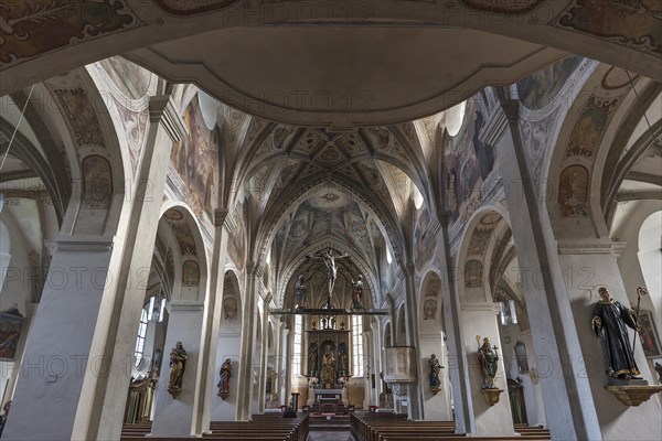 Church room with altar and crucifixion group in the monastery church of St. Lambert