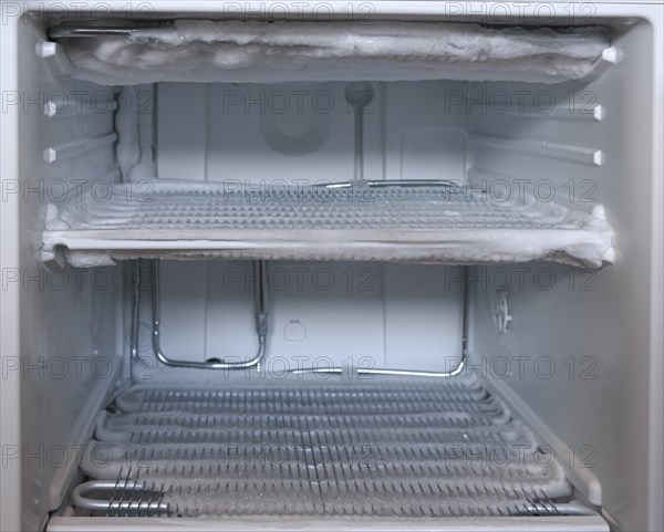 A very icy open freezer