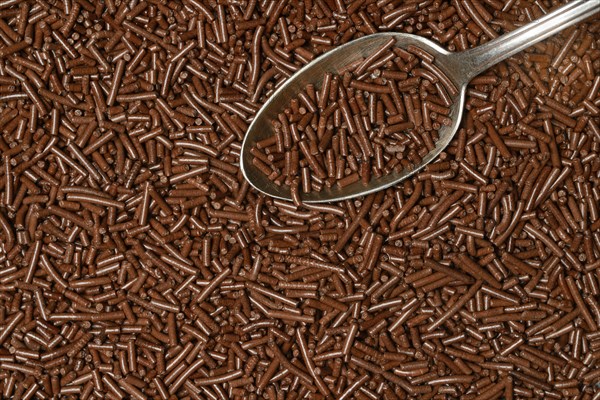 Chocolate sprinkles with teaspoon