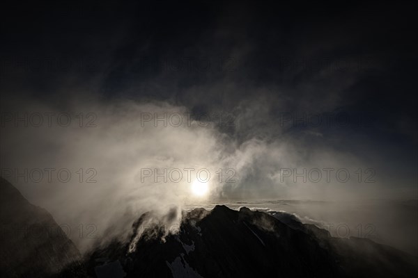 Summit of the Altmann with wispy clouds at sunrise