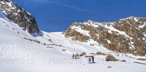 Group of ski tourers ascending the Berglasferner