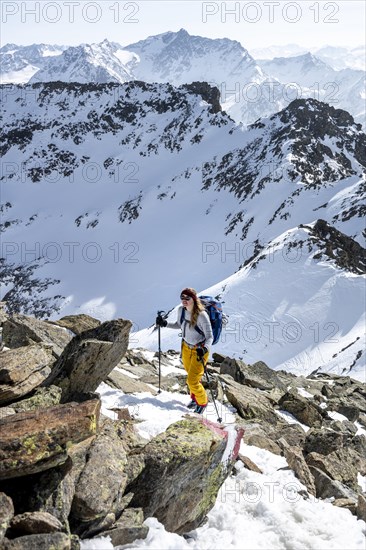 Mountaineer at the summit of the Sulzkogel