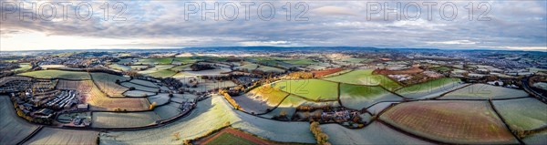 Frosty fields and farms from a drone