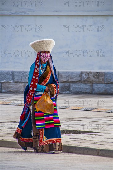 Traditional dressed woman on the festival of the tribes in Gerze Western Tibet