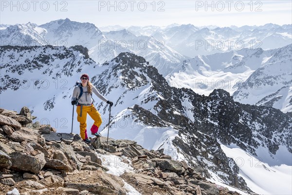 Mountaineer at the summit of the Sulzkogel