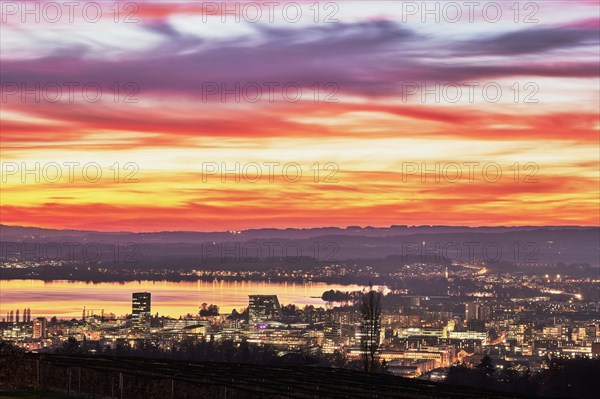 Evening mood with skyline and Lake Zug in the foreground the skyscrapers Parktower and Uptown