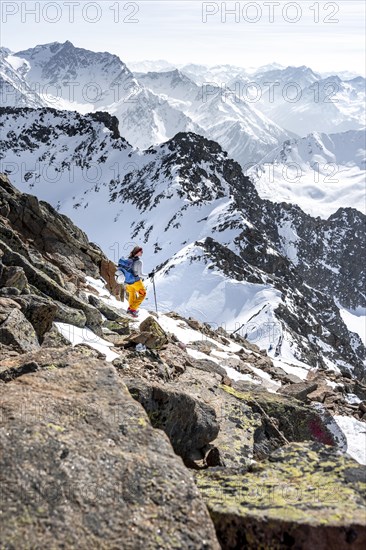 Mountaineer at the summit of the Sulzkogel