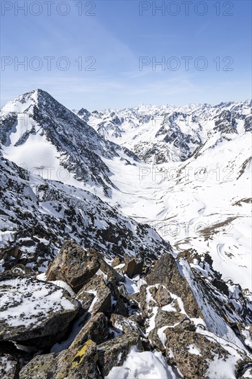 Mountain panorama of the Stubai Alps in winter with Schrankarkogel peak