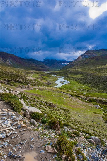 River snakes through as valley