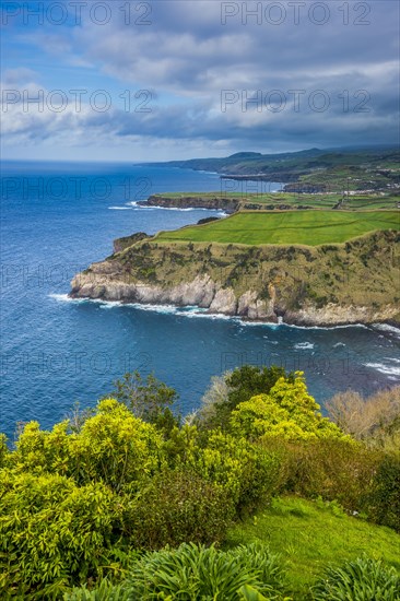 Overlook over the northern coastline from the viewpoint Santa Iria Island of Sao Miguel