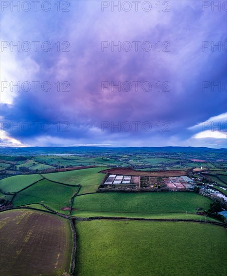 Sunset over Fields and Farms from a drone