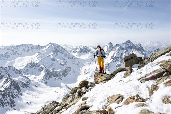 Mountaineer at the summit of the Sulzkogel