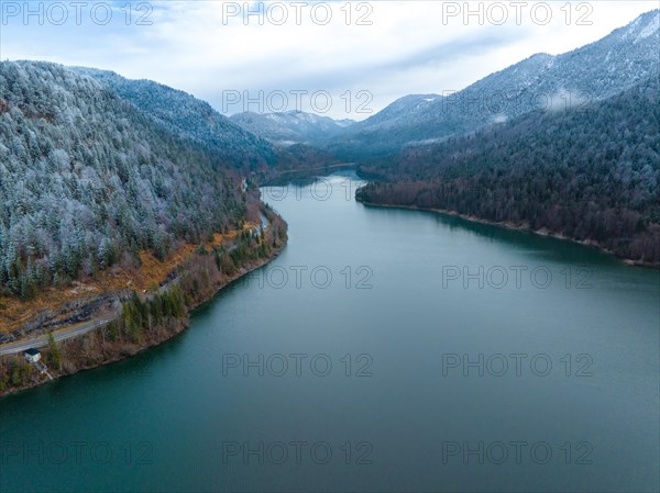 Road by the water in winter