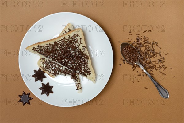 Toast with chocolate sprinkles on plate