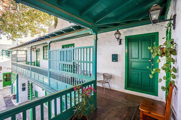 Picturesque white and green settlement called Pueblo Marinero designed by Cesar Manrique located in Costa Teguise