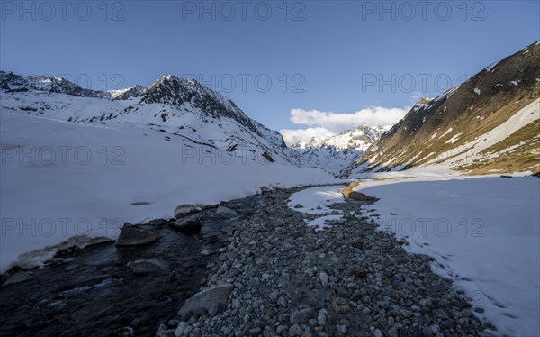 Snow-covered mountains in the evening light