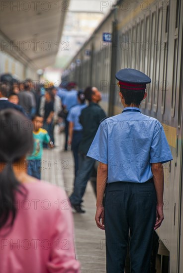 Ticket conductor in the Tibetan railway in Tibet