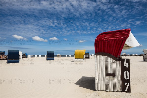 Beach chairs on the sandy beach