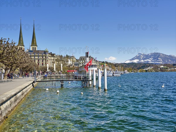 Ship restaurant in front of the court church of St. Leodegar hnten Rigi