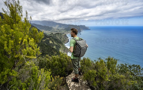 Hiker standing on a rock