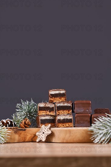 Halved taditional German sweets called 'Dominosteine'. Christmas candy consisting of gingerbread