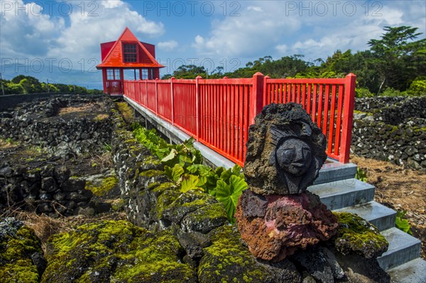 Red walkway in the UNESCO-designated historical vineyards in the Wine museum of Pico