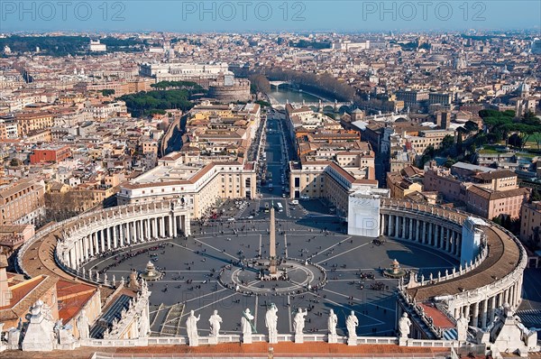 View from dome of St. Peter's Basilica to St. Peter's Square in front with obelisk colonnades by Bernini