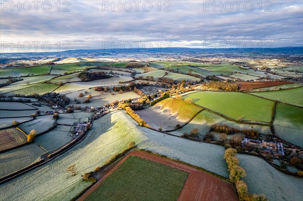 Frosty fields and farms from a drone
