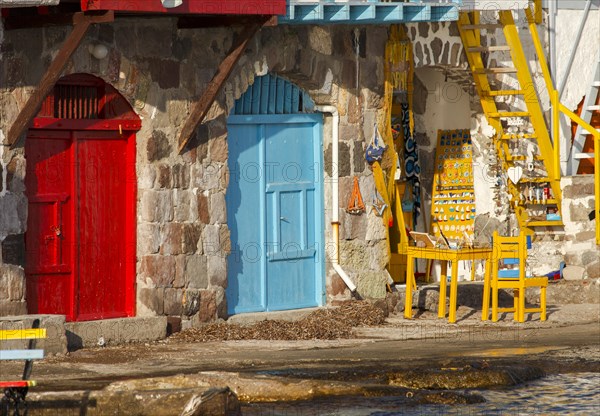 The Quaint Fishing Village with the Colorful Syrmata Boathouses in the small village of Klima on the island of Milos