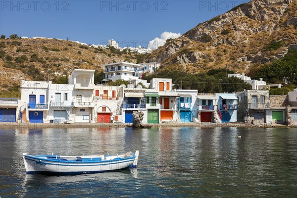 The Quaint Fishing Village with the Colorful Syrmata Boathouses in the small village of Mandraki on the island of Milos